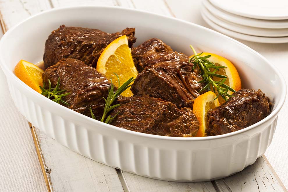 Carne assada com laranja e temperos frescos